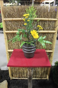 Susquehanna Bonsai Club's bamboo and stick backdrop mat wall.